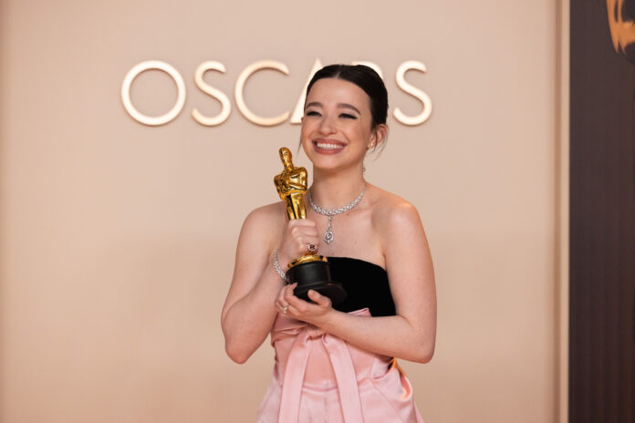 Mikey Madison poses backstage with the Oscar® for Actress in a Leading Role during the live ABC Telecast of the 97th Oscars® at Dolby® Theatre at Ovation Hollywood on Sunday, March 2, 2025.